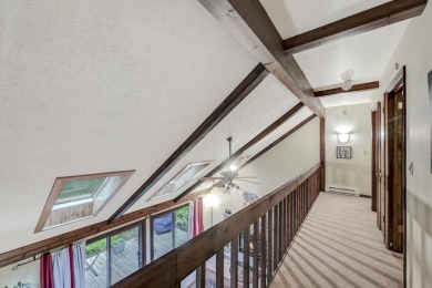 This spacious 4 bedroom, 3 bath home is located in the highly on Lake Naomi Timber Trails Golf Club in Pennsylvania - for sale on GolfHomes.com, golf home, golf lot
