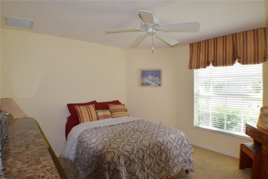 Enjoy golf course frontage in this beautifully maintained on Tampa Bay Golf and Country Club in Florida - for sale on GolfHomes.com, golf home, golf lot