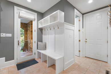 Crafted with care and brimming with delightful surprises, 32430 on Governors Club in North Carolina - for sale on GolfHomes.com, golf home, golf lot