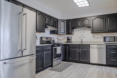 Welcome to this fully remodeled condo perfectly situated on on Lakes of the Four Seasons Country Club in Indiana - for sale on GolfHomes.com, golf home, golf lot