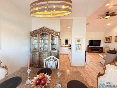 PANORAMIC VIEWS TO ENJOY FROM INDOORS OR THE COVERED PATIO on Sierra Del Rio Golf Club in New Mexico - for sale on GolfHomes.com, golf home, golf lot