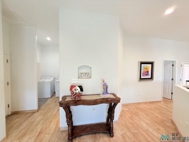 PANORAMIC VIEWS TO ENJOY FROM INDOORS OR THE COVERED PATIO on Sierra Del Rio Golf Club in New Mexico - for sale on GolfHomes.com, golf home, golf lot