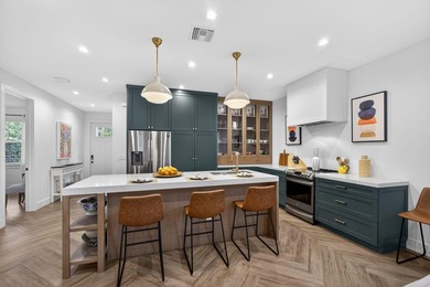 You'll find easy living in this move-in ready Arts and Crafts on Lake Worth Municipal Golf Course in Florida - for sale on GolfHomes.com, golf home, golf lot