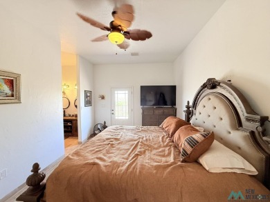PANORAMIC VIEWS TO ENJOY FROM INDOORS OR THE COVERED PATIO on Sierra Del Rio Golf Club in New Mexico - for sale on GolfHomes.com, golf home, golf lot