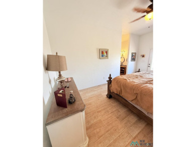 PANORAMIC VIEWS TO ENJOY FROM INDOORS OR THE COVERED PATIO on Sierra Del Rio Golf Club in New Mexico - for sale on GolfHomes.com, golf home, golf lot