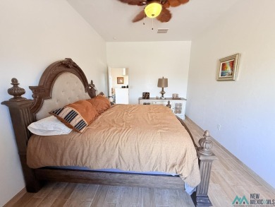 PANORAMIC VIEWS TO ENJOY FROM INDOORS OR THE COVERED PATIO on Sierra Del Rio Golf Club in New Mexico - for sale on GolfHomes.com, golf home, golf lot