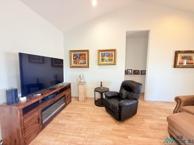 PANORAMIC VIEWS TO ENJOY FROM INDOORS OR THE COVERED PATIO on Sierra Del Rio Golf Club in New Mexico - for sale on GolfHomes.com, golf home, golf lot