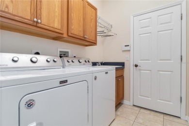 Welcome to a home that blends comfort, convenience, and a view on Links At Greenfield Plantation in Florida - for sale on GolfHomes.com, golf home, golf lot