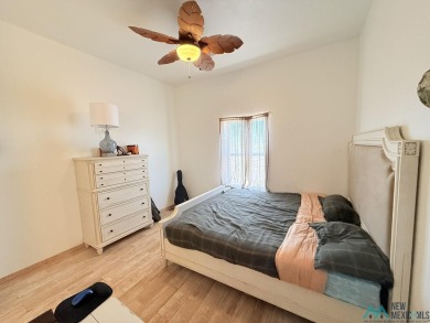 PANORAMIC VIEWS TO ENJOY FROM INDOORS OR THE COVERED PATIO on Sierra Del Rio Golf Club in New Mexico - for sale on GolfHomes.com, golf home, golf lot