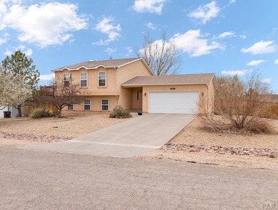 Nestled in the heart of the Pueblo West Golf Course community on Desert Hawk At Pueblo West in Colorado - for sale on GolfHomes.com, golf home, golf lot