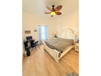 PANORAMIC VIEWS TO ENJOY FROM INDOORS OR THE COVERED PATIO on Sierra Del Rio Golf Club in New Mexico - for sale on GolfHomes.com, golf home, golf lot