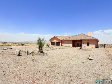 PANORAMIC VIEWS TO ENJOY FROM INDOORS OR THE COVERED PATIO on Sierra Del Rio Golf Club in New Mexico - for sale on GolfHomes.com, golf home, golf lot