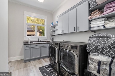 The home of your dreams awaits you! Discover this prestigious on Country Club of the South in Georgia - for sale on GolfHomes.com, golf home, golf lot