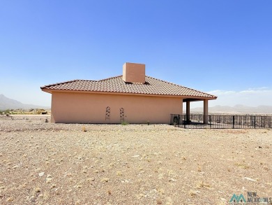 PANORAMIC VIEWS TO ENJOY FROM INDOORS OR THE COVERED PATIO on Sierra Del Rio Golf Club in New Mexico - for sale on GolfHomes.com, golf home, golf lot