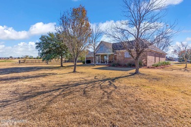 Welcome to 100 Scotlands Court. Nestled at the back of a quiet on Castle Bay Golf and Country Club in North Carolina - for sale on GolfHomes.com, golf home, golf lot