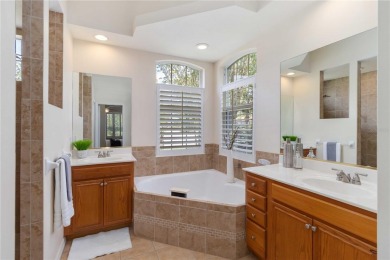 Welcome to a home that blends comfort, convenience, and a view on Links At Greenfield Plantation in Florida - for sale on GolfHomes.com, golf home, golf lot