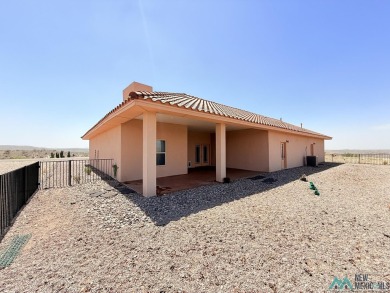 PANORAMIC VIEWS TO ENJOY FROM INDOORS OR THE COVERED PATIO on Sierra Del Rio Golf Club in New Mexico - for sale on GolfHomes.com, golf home, golf lot
