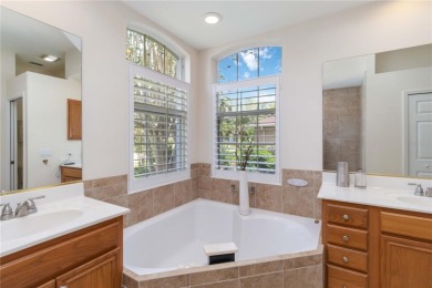 Welcome to a home that blends comfort, convenience, and a view on Links At Greenfield Plantation in Florida - for sale on GolfHomes.com, golf home, golf lot