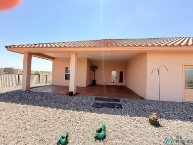 PANORAMIC VIEWS TO ENJOY FROM INDOORS OR THE COVERED PATIO on Sierra Del Rio Golf Club in New Mexico - for sale on GolfHomes.com, golf home, golf lot