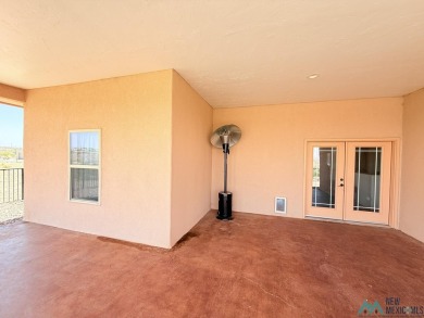 PANORAMIC VIEWS TO ENJOY FROM INDOORS OR THE COVERED PATIO on Sierra Del Rio Golf Club in New Mexico - for sale on GolfHomes.com, golf home, golf lot