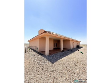 PANORAMIC VIEWS TO ENJOY FROM INDOORS OR THE COVERED PATIO on Sierra Del Rio Golf Club in New Mexico - for sale on GolfHomes.com, golf home, golf lot