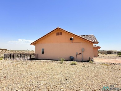 PANORAMIC VIEWS TO ENJOY FROM INDOORS OR THE COVERED PATIO on Sierra Del Rio Golf Club in New Mexico - for sale on GolfHomes.com, golf home, golf lot