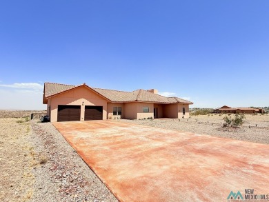 PANORAMIC VIEWS TO ENJOY FROM INDOORS OR THE COVERED PATIO on Sierra Del Rio Golf Club in New Mexico - for sale on GolfHomes.com, golf home, golf lot