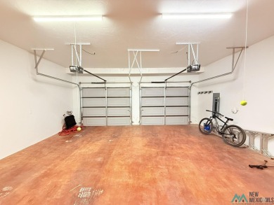 PANORAMIC VIEWS TO ENJOY FROM INDOORS OR THE COVERED PATIO on Sierra Del Rio Golf Club in New Mexico - for sale on GolfHomes.com, golf home, golf lot