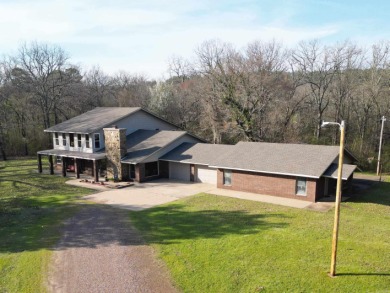 Enjoy hunting the Muddy Creek Wildlife Management Area, floating on Waldron Country Club in Arkansas - for sale on GolfHomes.com, golf home, golf lot