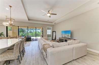 Experience tranquil Florida living in this stunning WCI-built on Sarasota National Golf Club in Florida - for sale on GolfHomes.com, golf home, golf lot