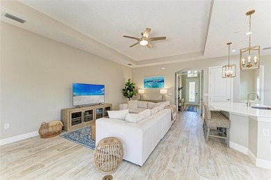 Experience tranquil Florida living in this stunning WCI-built on Sarasota National Golf Club in Florida - for sale on GolfHomes.com, golf home, golf lot