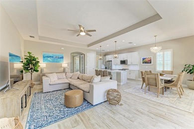 Experience tranquil Florida living in this stunning WCI-built on Sarasota National Golf Club in Florida - for sale on GolfHomes.com, golf home, golf lot