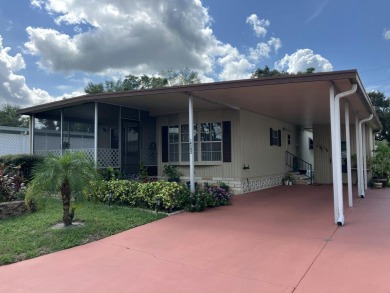 This two bedroom, two bath home is ready to be yours. The AC is on Fairways Country Club in Florida - for sale on GolfHomes.com, golf home, golf lot