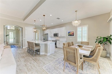 Experience tranquil Florida living in this stunning WCI-built on Sarasota National Golf Club in Florida - for sale on GolfHomes.com, golf home, golf lot