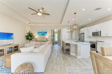 Experience tranquil Florida living in this stunning WCI-built on Sarasota National Golf Club in Florida - for sale on GolfHomes.com, golf home, golf lot