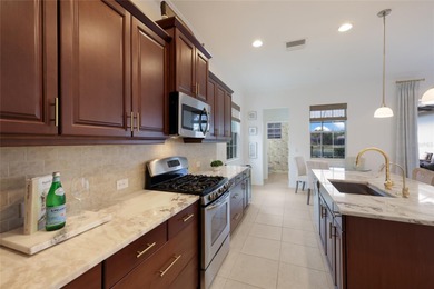 Beautifully maintained three-bedroom residence with a dedicated on Ritz-Carlton Members Golf Club in Florida - for sale on GolfHomes.com, golf home, golf lot