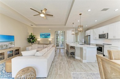 Experience tranquil Florida living in this stunning WCI-built on Sarasota National Golf Club in Florida - for sale on GolfHomes.com, golf home, golf lot