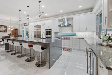 Elegant Golf Course Estate with Immediate Full Golf Membership! on Jupiter Country Club in Florida - for sale on GolfHomes.com, golf home, golf lot