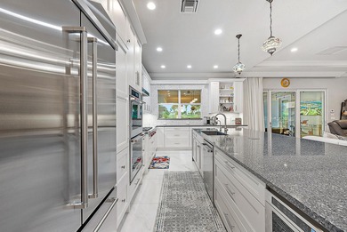 Elegant Golf Course Estate with Immediate Full Golf Membership! on Jupiter Country Club in Florida - for sale on GolfHomes.com, golf home, golf lot