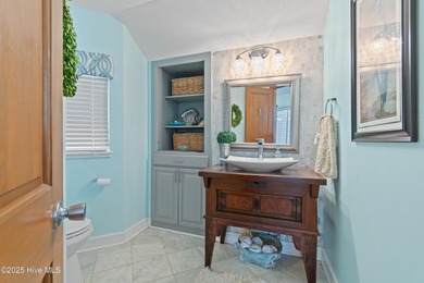 Welcome to this beautiful 3-bedroom, 2 1/2 bath home perfectly on Lockwood Folly Country Club in North Carolina - for sale on GolfHomes.com, golf home, golf lot