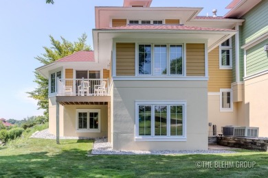 Discover your dream ski getaway in this 2-story, end-unit on Crystal Mountain Golf Course in Michigan - for sale on GolfHomes.com, golf home, golf lot