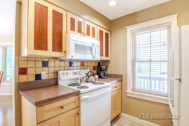 Discover your dream ski getaway in this 2-story, end-unit on Crystal Mountain Golf Course in Michigan - for sale on GolfHomes.com, golf home, golf lot