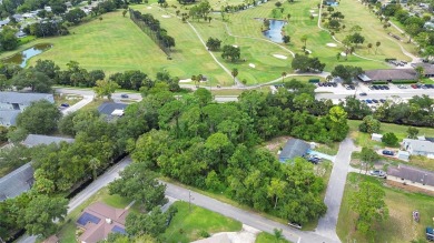 Nestled in the heart of New Smyrna Beach, this treed buildable on New Smyrna Beach Golf Course in Florida - for sale on GolfHomes.com, golf home, golf lot