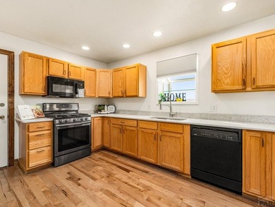 Fabulous location, location, location across from Hollydot Golf on Hollydot Golf Course in Colorado - for sale on GolfHomes.com, golf home, golf lot