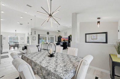 Immaculate Seagate-built Willow model located in the desirable on The Grand Club - Pine Lakes Course in Florida - for sale on GolfHomes.com, golf home, golf lot