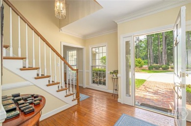 Spacious home on a large corner lot overlooking the 6th Green of on The Landings Club - Marshwood in Georgia - for sale on GolfHomes.com, golf home, golf lot