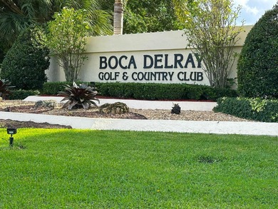 Enjoy serene views from this charming 1st floor 2BR/2BA + Den on Boca Delray Golf and Country Club in Florida - for sale on GolfHomes.com, golf home, golf lot