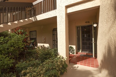 Enjoy serene views from this charming 1st floor 2BR/2BA + Den on Boca Delray Golf and Country Club in Florida - for sale on GolfHomes.com, golf home, golf lot