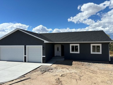 Beautiful 3-bedroom, 2-bathroom ranch-style home with a 3-car on Desert Hawk At Pueblo West in Colorado - for sale on GolfHomes.com, golf home, golf lot