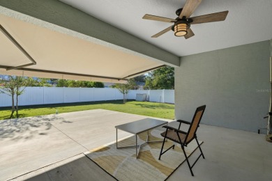 Immaculate Seagate-built Willow model located in the desirable on The Grand Club - Pine Lakes Course in Florida - for sale on GolfHomes.com, golf home, golf lot